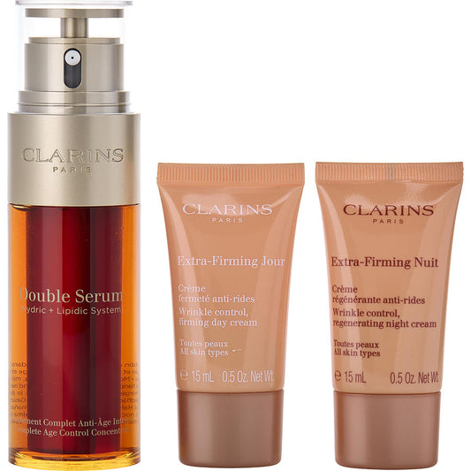 Clarins double serum 50ml + extra-firming day cream ast 15ml + extra-firming night cream ast 15ml + double serum eye sachet 0.9ml -4pcs