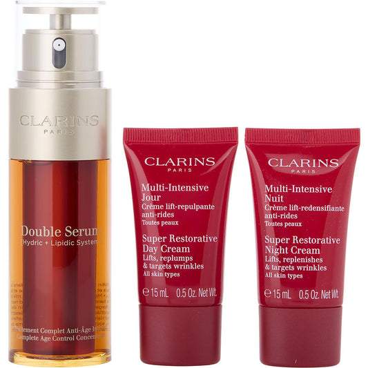 Clarins double serum 50ml + super restorative day cream ast 15ml + super restorative night cream ast 15ml + double serum eye sachet 0.9ml -4pcs